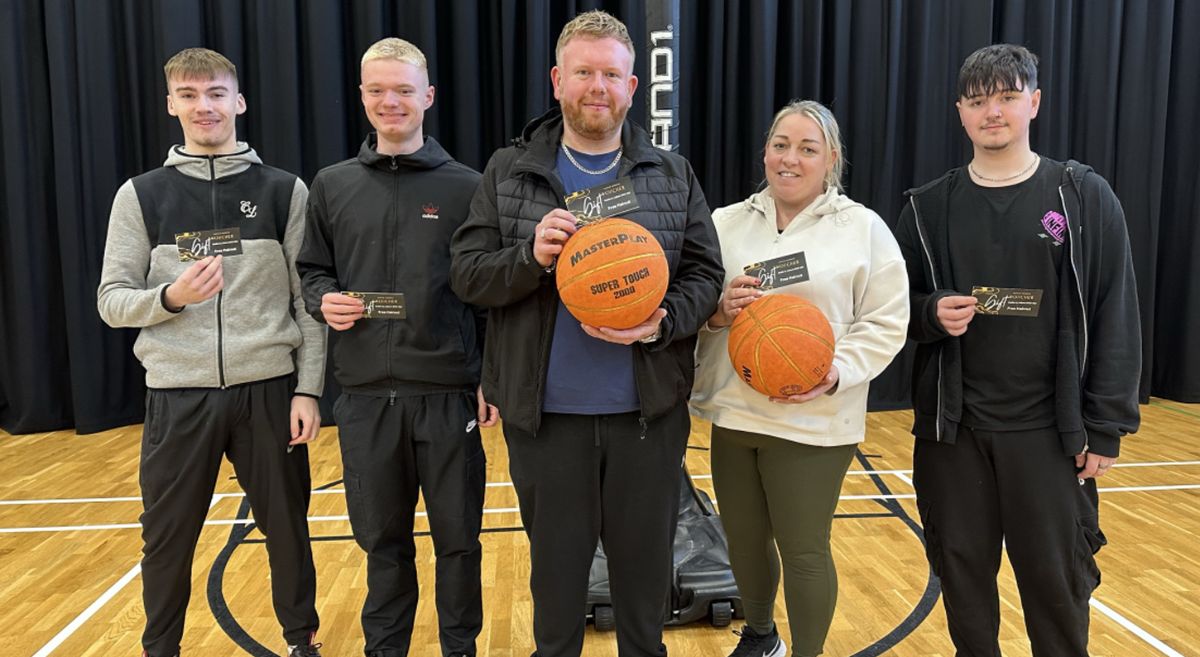 Picture of Barbering students at the Basketball Free-Throw event. 